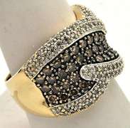 LADIES 14K GOLD WITH WHITE AND CHOCOLATE DIAMONDS.