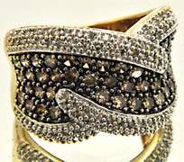 LADIES 14K GOLD WITH WHITE AND CHOCOLATE DIAMONDS.