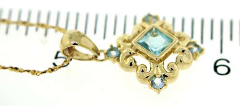 Fantastic Blue Topaz Filgree Pendant Necklace