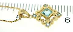Fantastic Blue Topaz Filgree Pendant Necklace