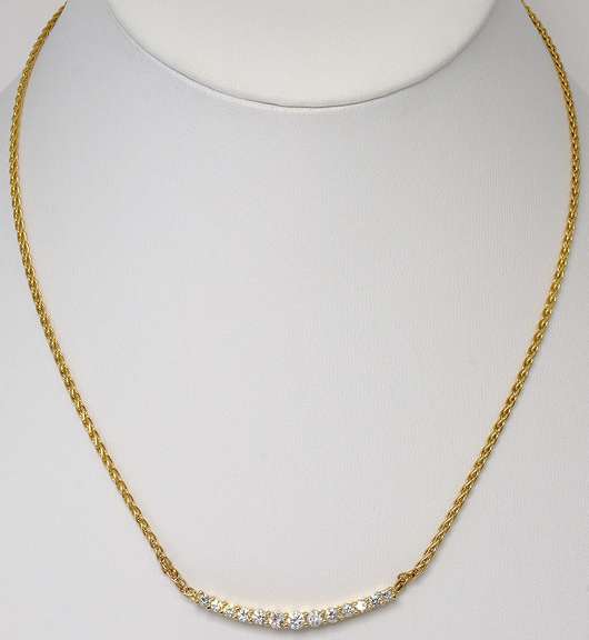 Stunning 0.69CTW Diamond Necklace in 14KT Yellow Gold
