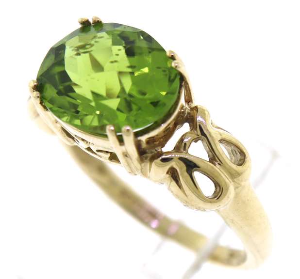 Fancy Oval Peridot Yellow Gold Ring