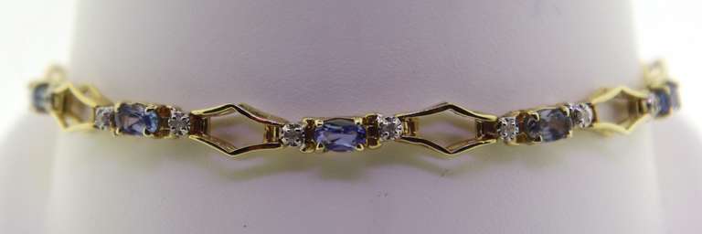 Pretty Yellow Gold Blue Topaz Bracelet