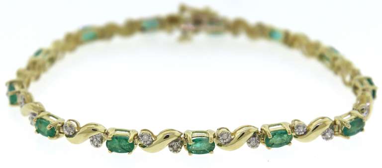 Stunning 14kt YG Emerald and Diamond Accent Line Bracelet