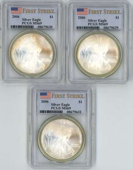 3 Near Perfect 2006 First Strike $1 Eagles. PCGS MS69