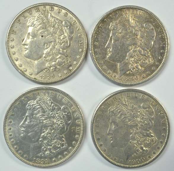 4 Upper end Morgan Silver Dollars. All different