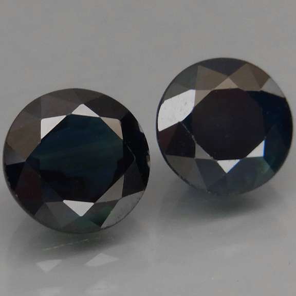 Heated Only! 3.38ct midnight blue Sapphire set