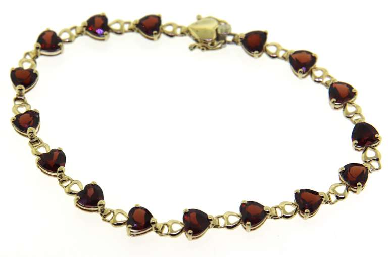 Stunning Yellow Gold Garnet Heart Bracelet