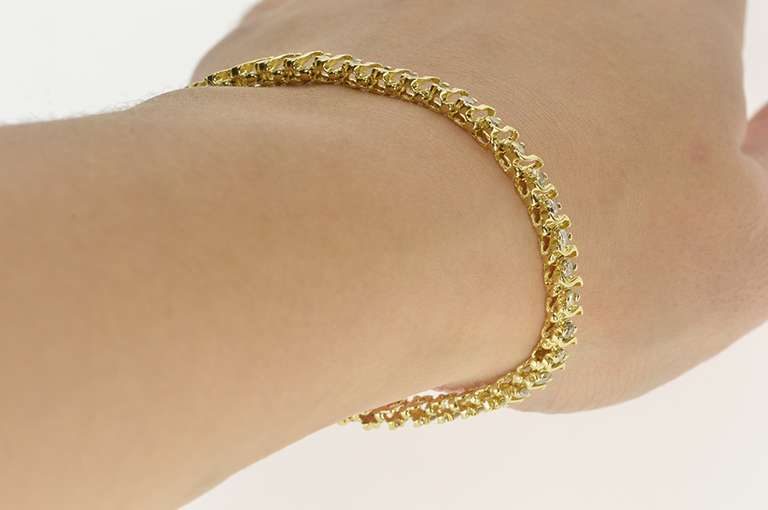 14K Yellow Gold 2.50 Ctw Diamond Inset Wavy Pattern Tennis Bracelet