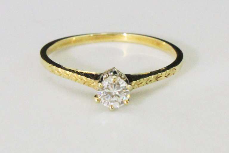 Delicate Diamond Solitaire in 14k