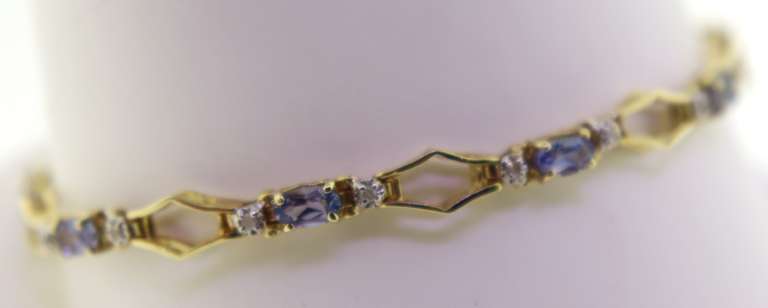 Pretty Yellow Gold Blue Topaz Bracelet