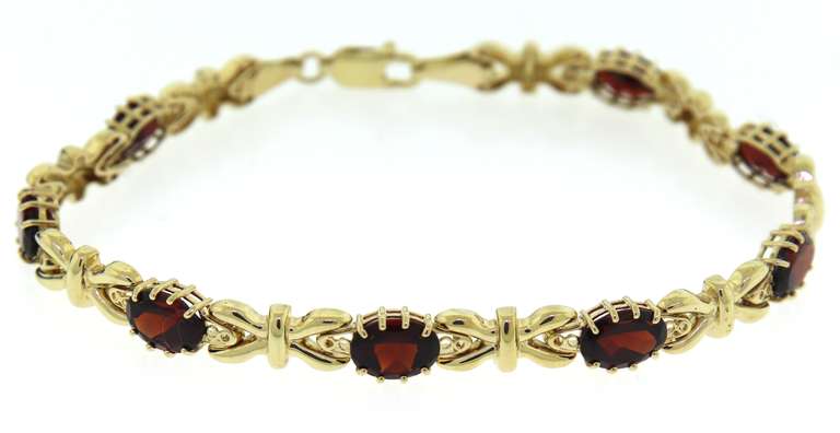 Pretty Oval Garnet Bracelet in 14kt
