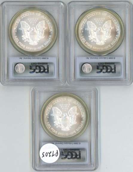 3 Near Perfect 2006 First Strike $1 Eagles. PCGS MS69
