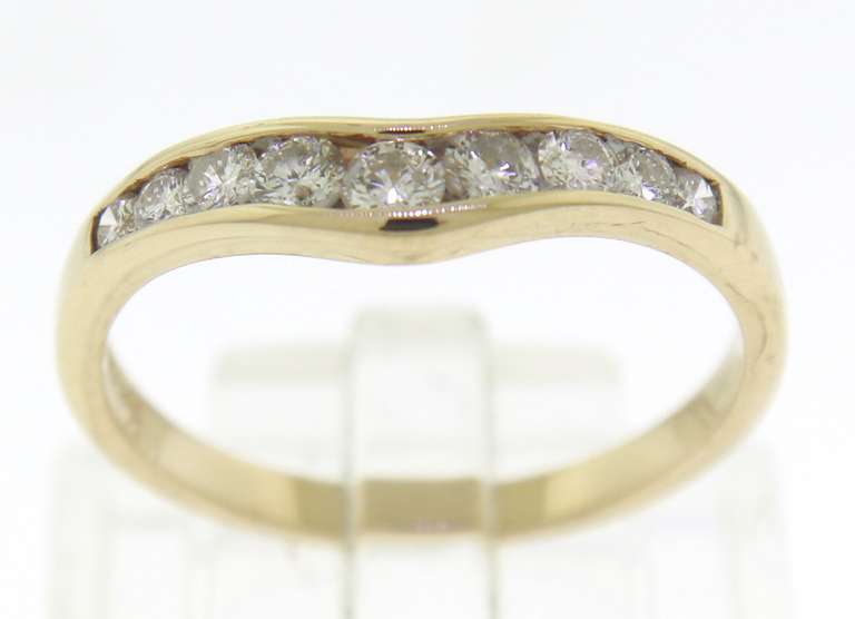 Classic 14kt YG Channel Set Curved Diamond Band