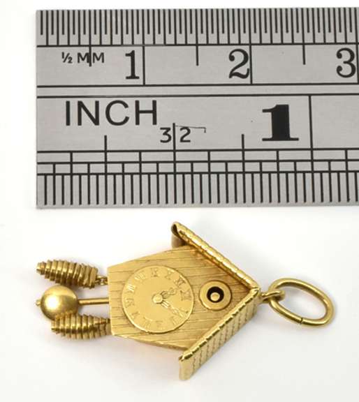 Well Detailed 18k Clock Charm