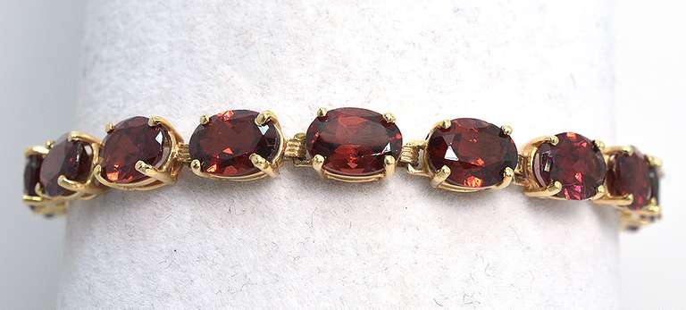 Garnet Tennis Style Bracelet in 14KT