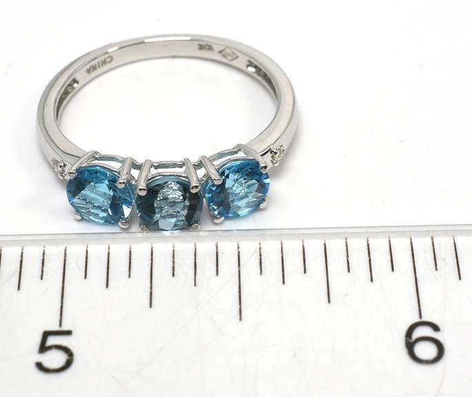 Blue Topaz Ring in White Gold