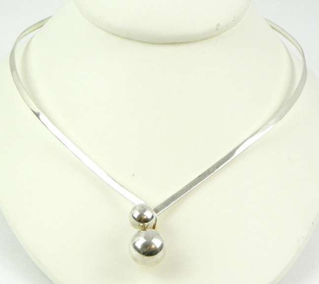 Sleek Sterling Silver Ball Neckpiece