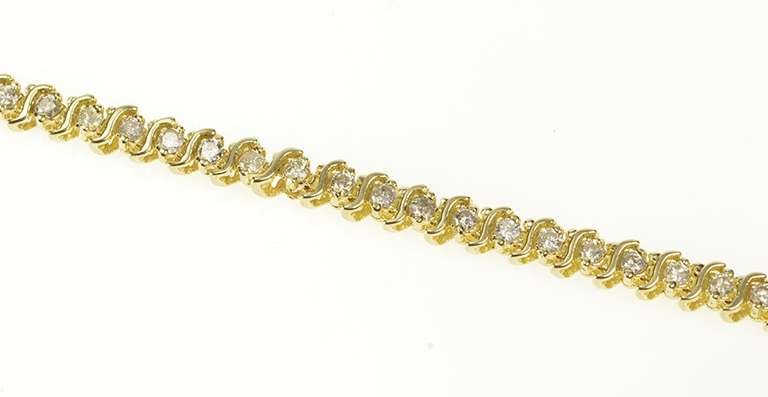 14K Yellow Gold 2.50 Ctw Diamond Inset Wavy Pattern Tennis Bracelet