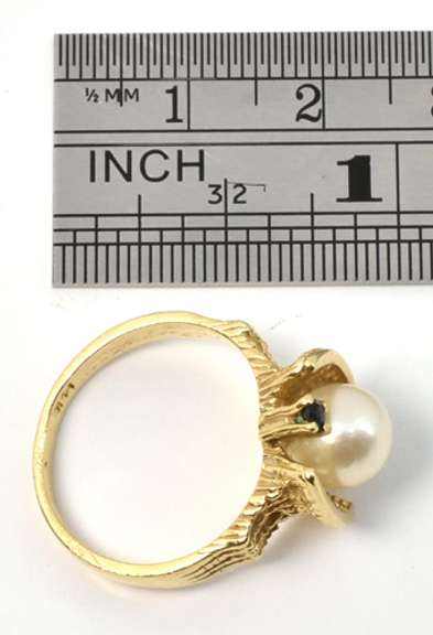 Feminine Pearl Ring with Sapphire Accents