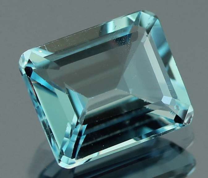 Ravishing 7.10ct 10x12mm emerald cut Topaz