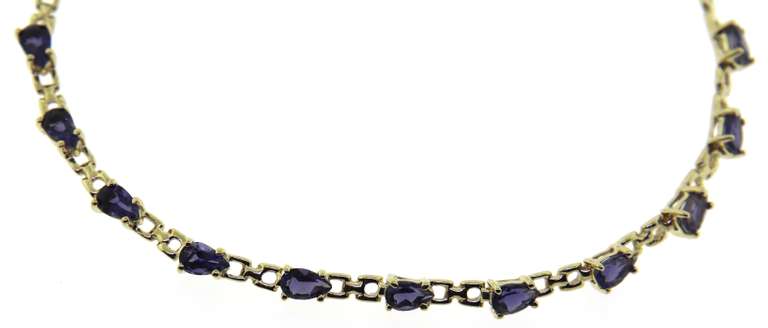 Beautiful Pear Iolite Line Bracelet in 14kt