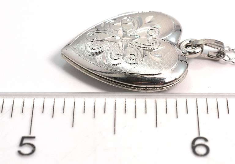 Sweet Lasered Heart Locket in Sterling Silver