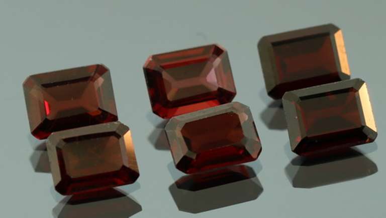 Ravishing wine red 13.63ct untreated Garnet set