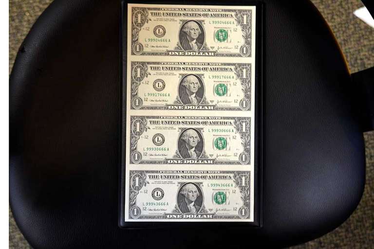 Uncut sheet of 4 One dollar bills A series  2003