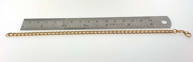 Simple 14kt yellow gold curb link bracelet