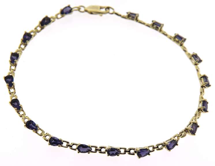 Beautiful Pear Iolite Line Bracelet in 14kt