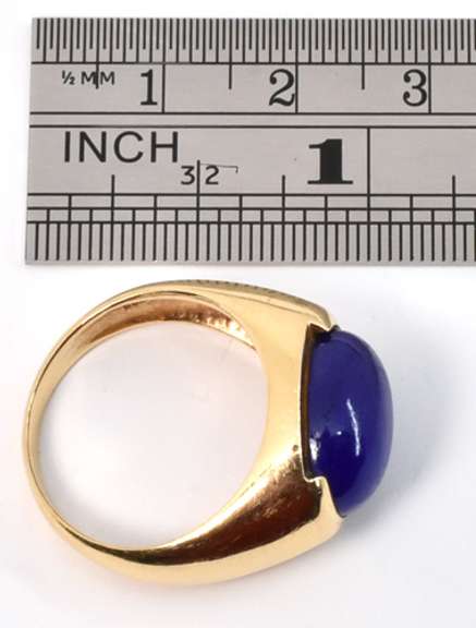 Tasteful Man's Cabochon Lapis Ring in 14k yellow gold weighing 6.3 grams.
