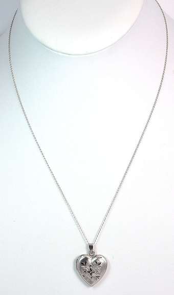 Sweet Lasered Heart Locket in Sterling Silver