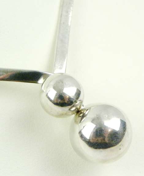 Sleek Sterling Silver Ball Neckpiece