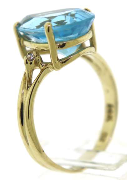 Charming Blue Topaz & Diamond Accent Ring