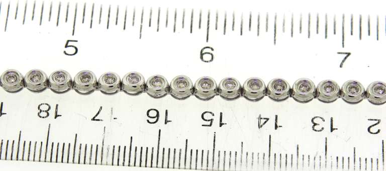 Attractive White Gold Bezel Set Diamond Bracelet