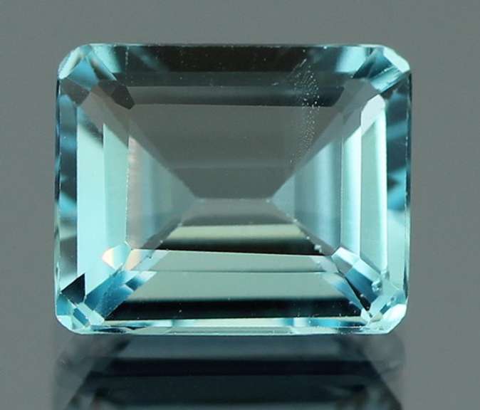 Ravishing 7.10ct 10x12mm emerald cut Topaz