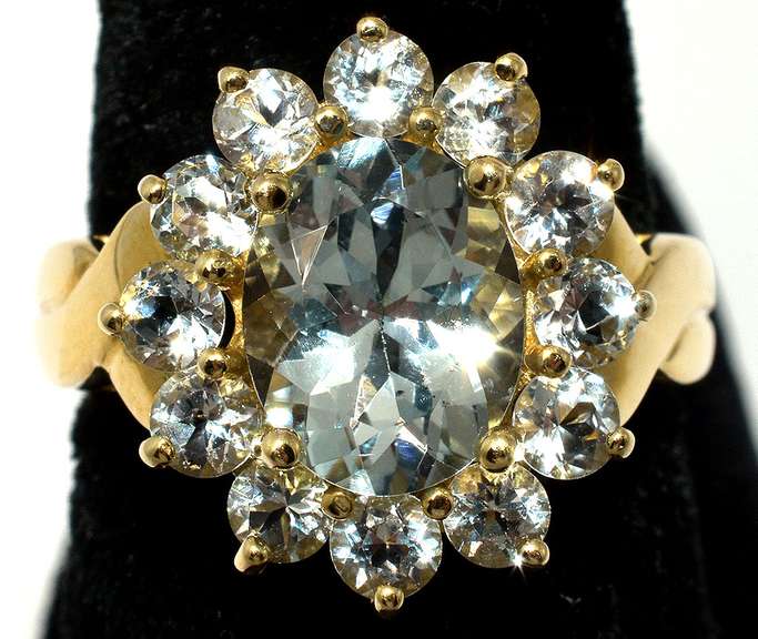 Breathtaking Aquamarine Halo Ring in 14KT Yellow Gold