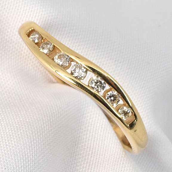 Curved Channel Set Diamond Ring