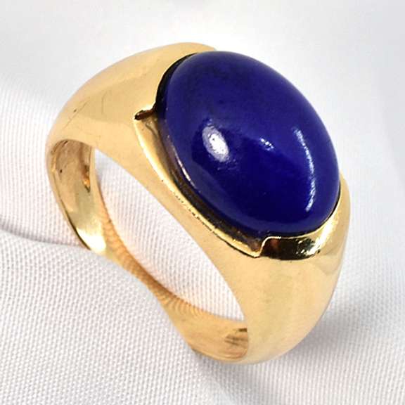 Tasteful Man's Cabochon Lapis Ring in 14k yellow gold weighing 6.3 grams.
