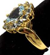 Breathtaking Aquamarine Halo Ring in 14KT Yellow Gold