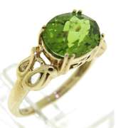 Fancy Oval Peridot Yellow Gold Ring