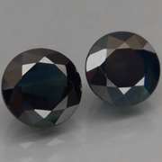 Heated Only! 3.38ct midnight blue Sapphire set