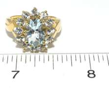Breathtaking Aquamarine Halo Ring in 14KT Yellow Gold