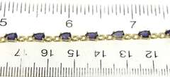 Beautiful Pear Iolite Line Bracelet in 14kt