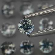 Multi-hue 3.97ct natural silver-blue Sapphire set