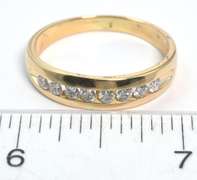 0.63CTW Diamond Band in 14KT Yellow Gold