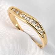 Curved Channel Set Diamond Ring