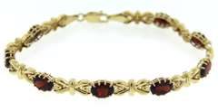 Pretty Oval Garnet Bracelet in 14kt