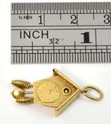Well Detailed 18k Clock Charm